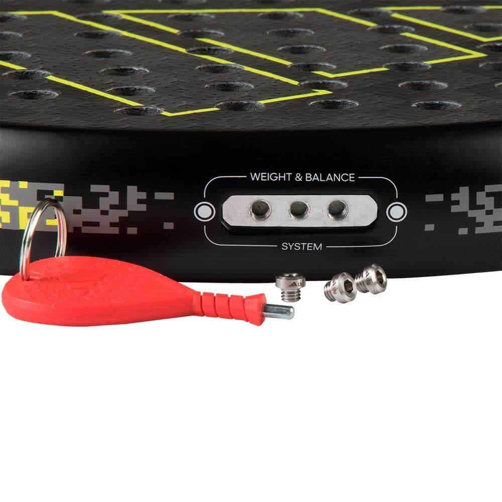 Adidas Adipower paddle weight and balance system with red key and screws for custom adjustments.